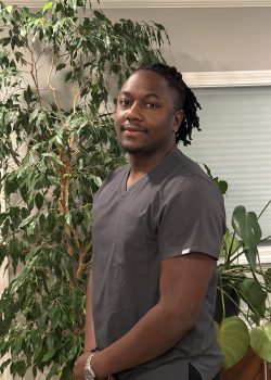 portrait of Raquel Cappotto, a licensed massage therapist and reiki practitioner at Branch to Root Wellness center in Salem MA